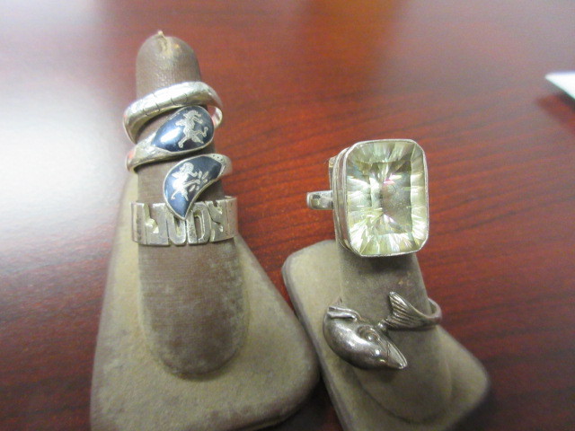 FIVE STERLING SILVER RINGS