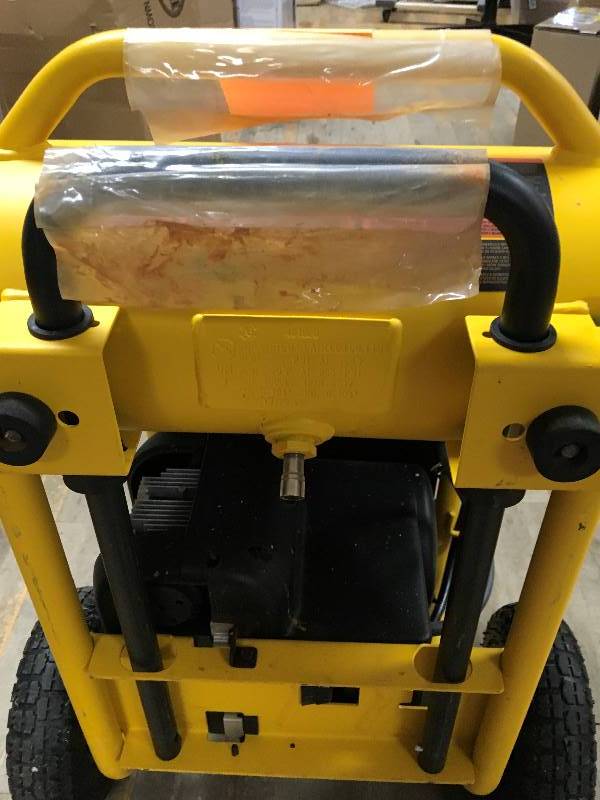 lot 4 image: Dewalt 4.5 Gal. Portable Electric Air Compressor used in working conditions