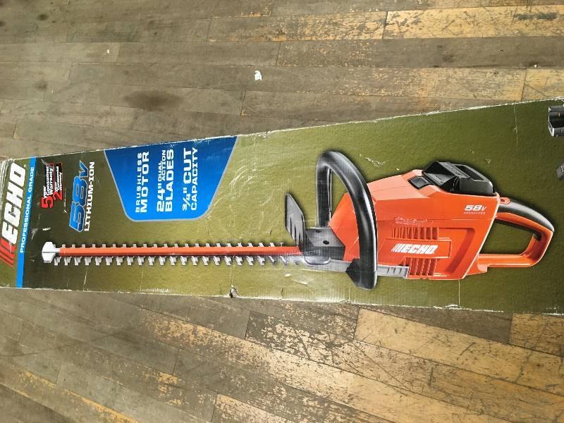 lot 11 image: ECHO 24 in. 58-Volt Lithium-Ion Brushless Cordless Hedge Trimmer - 2.0 Ah Battery and Charger Included in working conditions