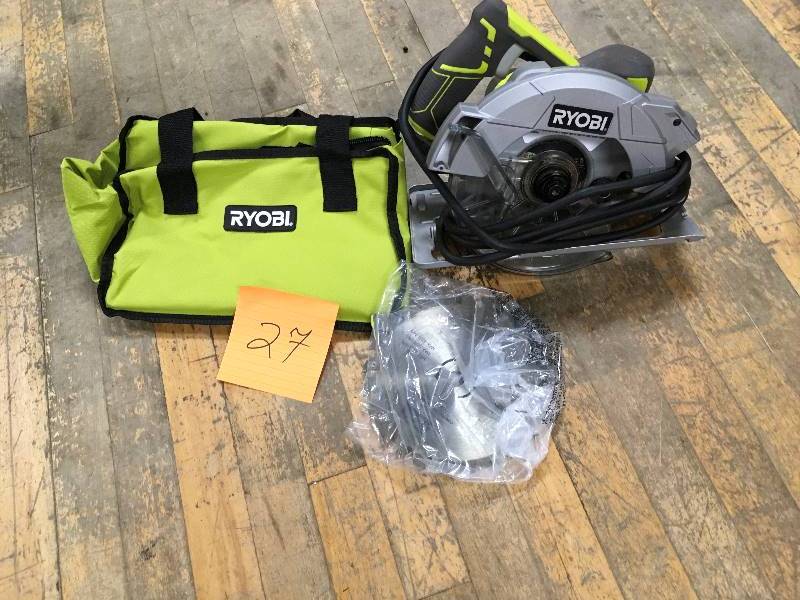 lot 27 image: Ryobi 15 Amp 7-14 in. Circular Saw with Laser in working conditions