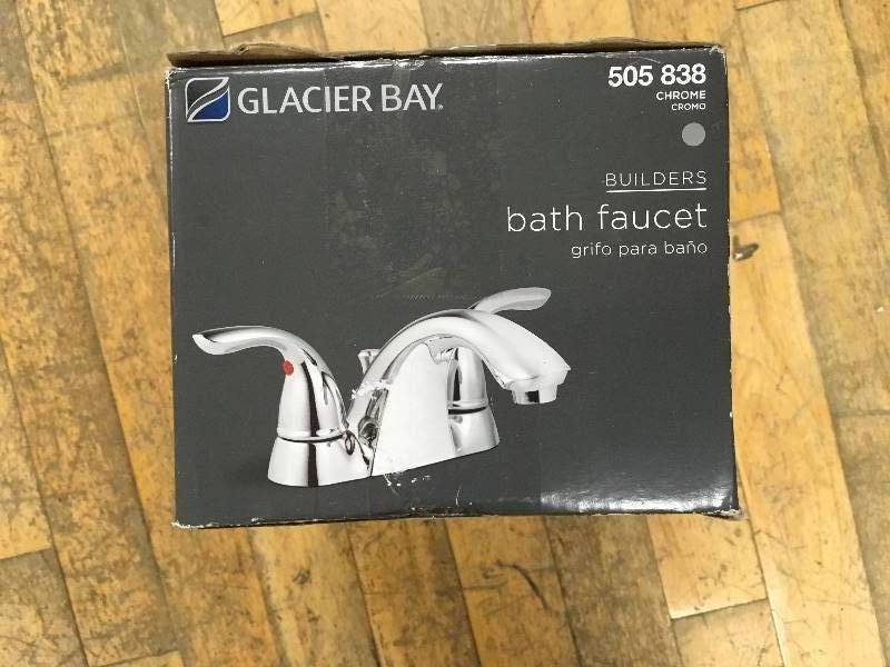 lot 48 image: Glacier Bay Builders 4 in. Centerset 2-Handle Low-Arc Bathroom Faucet in Chrome not used