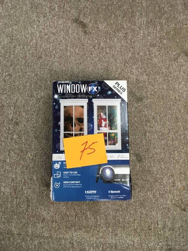 lot 75 image: Window Plus 2017 Projector not used