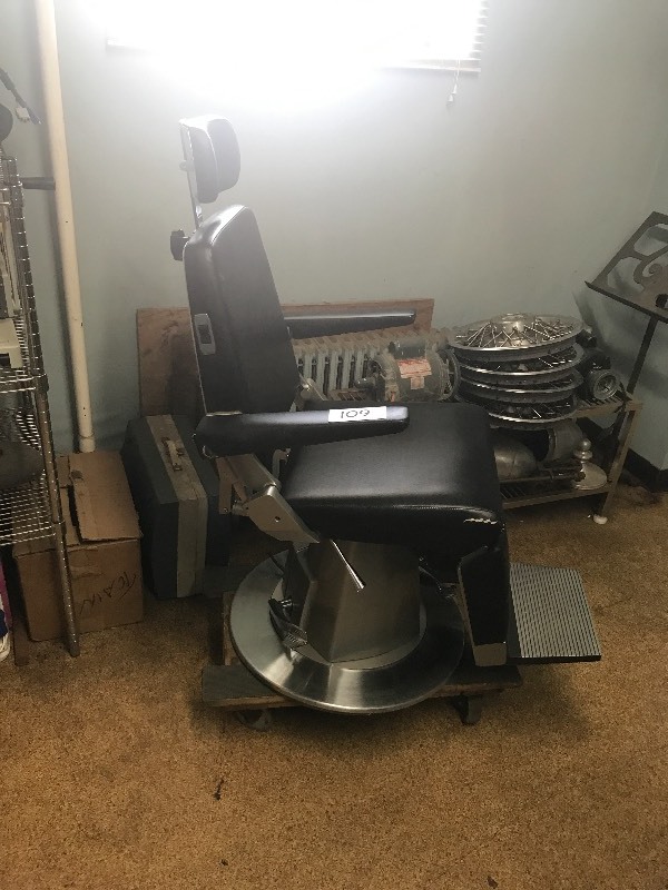 Hydraulic exam chair