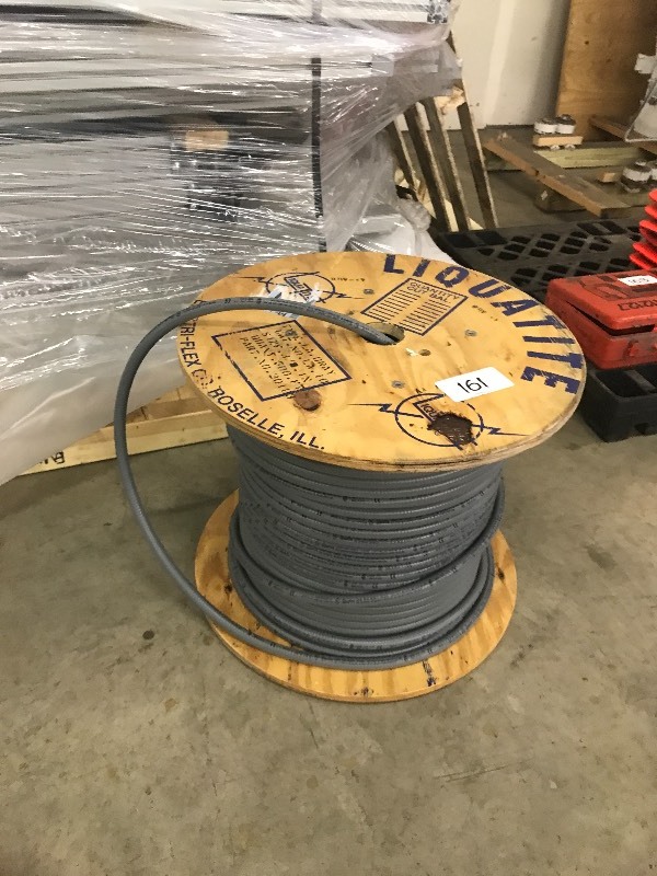 Spool of rubber coated conduit