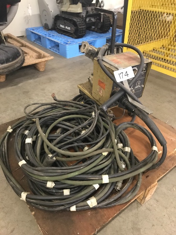 Wire feed welder head