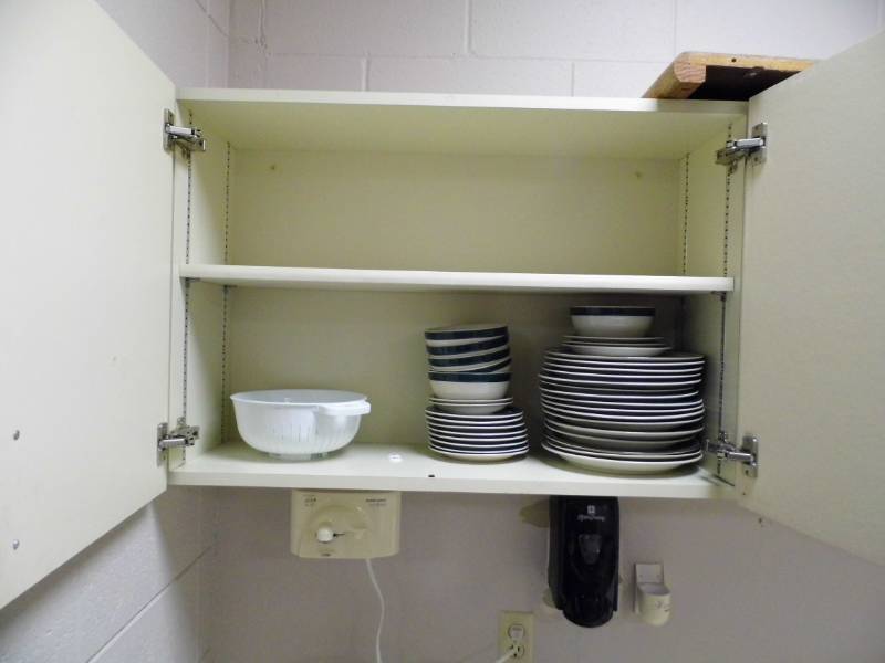 lot 25 image: Cabinets w Dishes