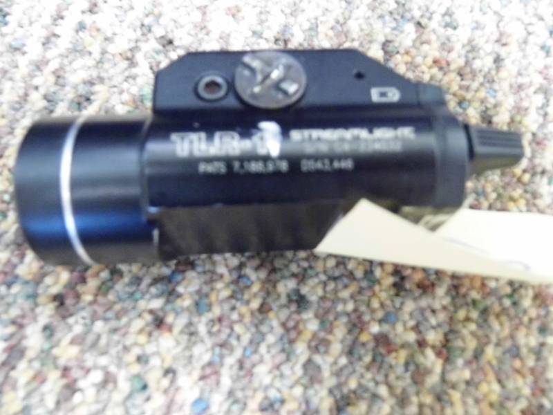 lot 103 image: Pistol Light