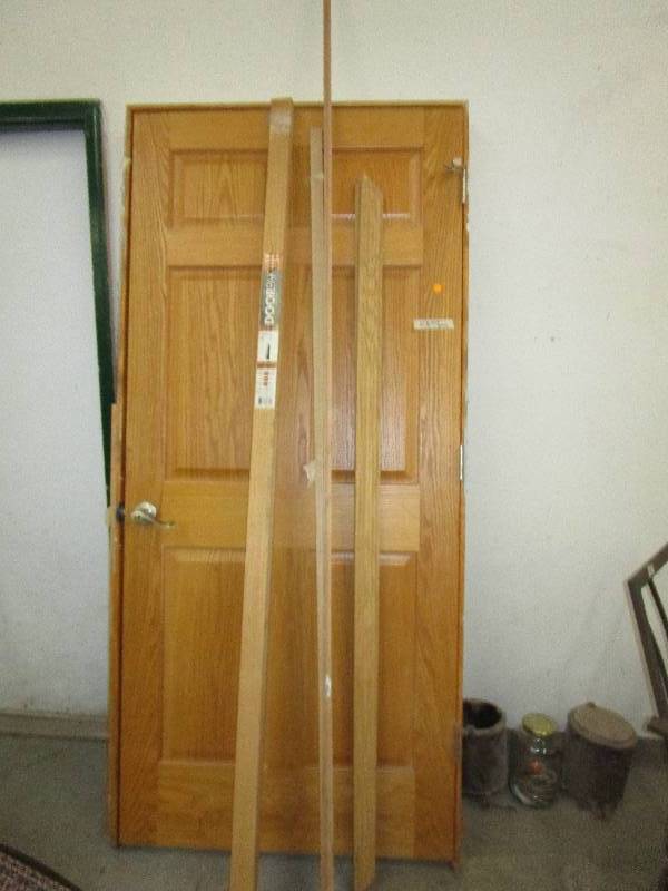 lot 3 image: 6 Panel Solid Oak Door With 3 Pieces of Trim, 37 34 X 81 R.O.