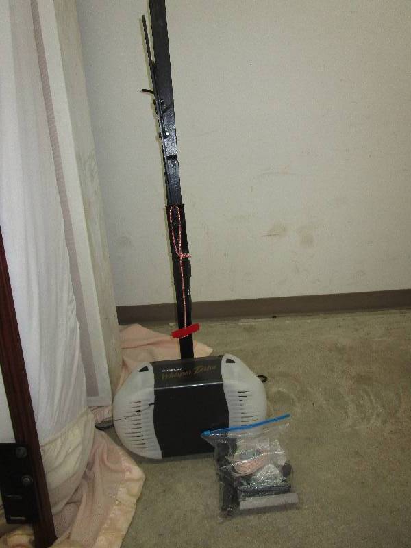 lot 19 image: Chamberlain Whisper Drive Garage Door Opener comes with remote and extras