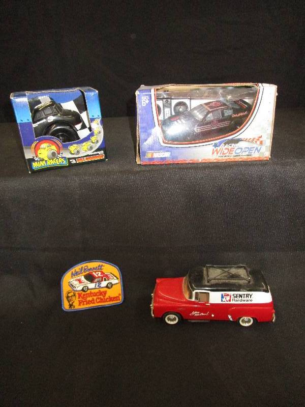 lot 30 image: Mini Racers #3, Racing Wide Open Radio Control Car with Remote, Security Hardware Old Car, Neil Bonnett Patch