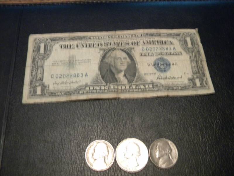 lot 22 image: 1957 Blue Seal One Dollar Silver Cert.(has tear),1942 Wash. Silver Quarter,1941 Nickel &1943 Silver Nickel