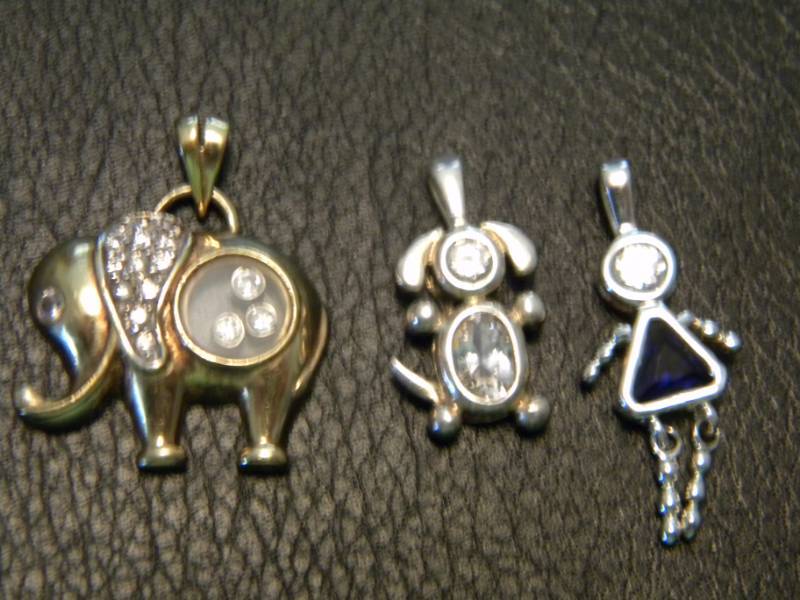 lot 34 image: 3 Sterling Silver Pendants