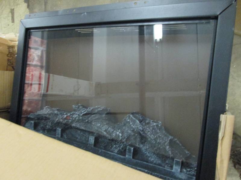 lot 7 image: 24 inch Fireplace Insert , open box...