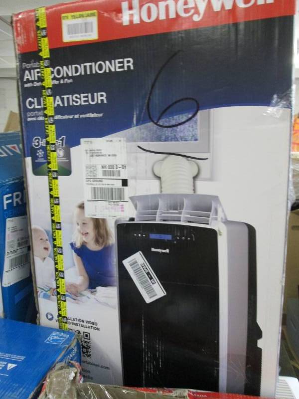 lot 86 image: Honeywell MM14CCS Portable Air Cond...