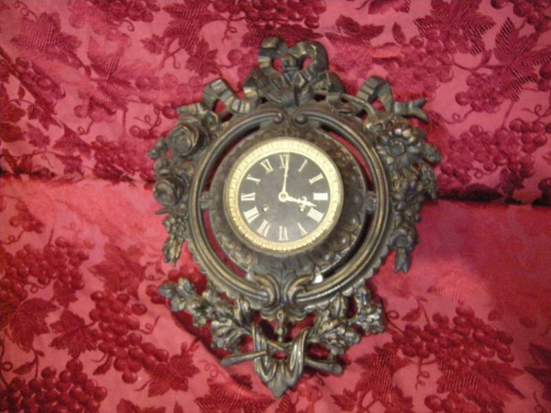 lot 36 image: Antique Cast Wall Clock