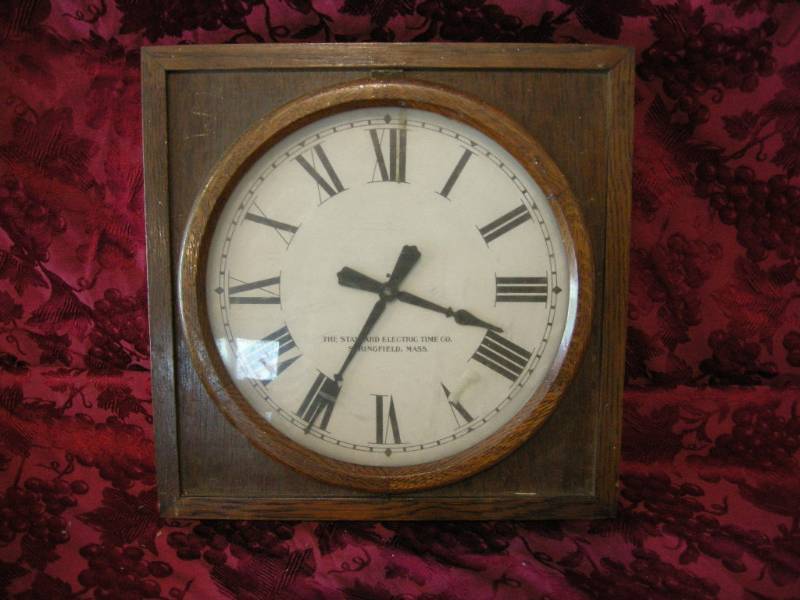 lot 64 image: Antique The Standard Electric Time Co Wall Clock