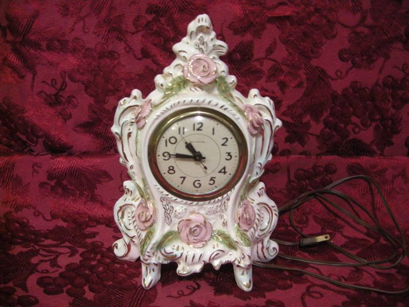lot 201 image: Antique Lanshire Selfstarting Porcelain Clock