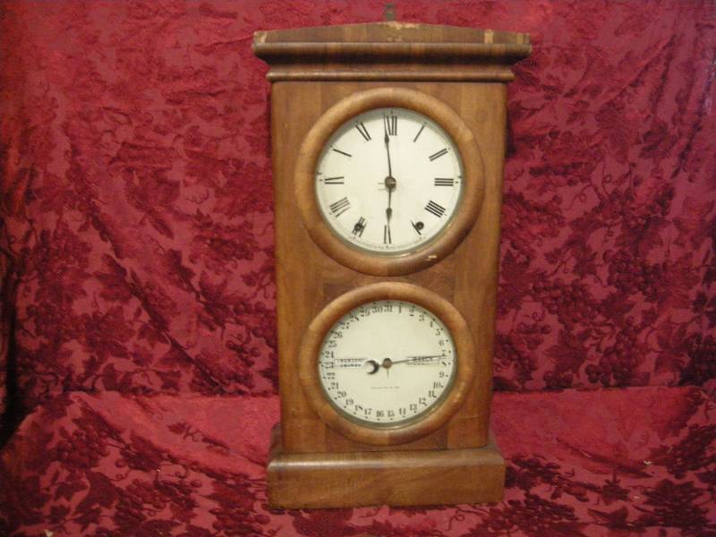 lot 252 image: Antique Seth Thomas Double Dial Calendar Clock