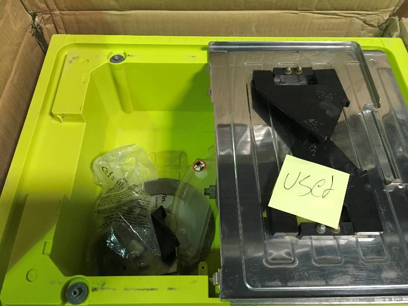 lot 30 image: Ryobi 7 in. 4.8 Amp Tabletop Tile Saw used in working conditions