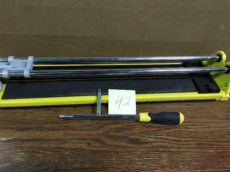 lot 42 image: QEP 21 in. Ceramic Tile Cutter in working conditions