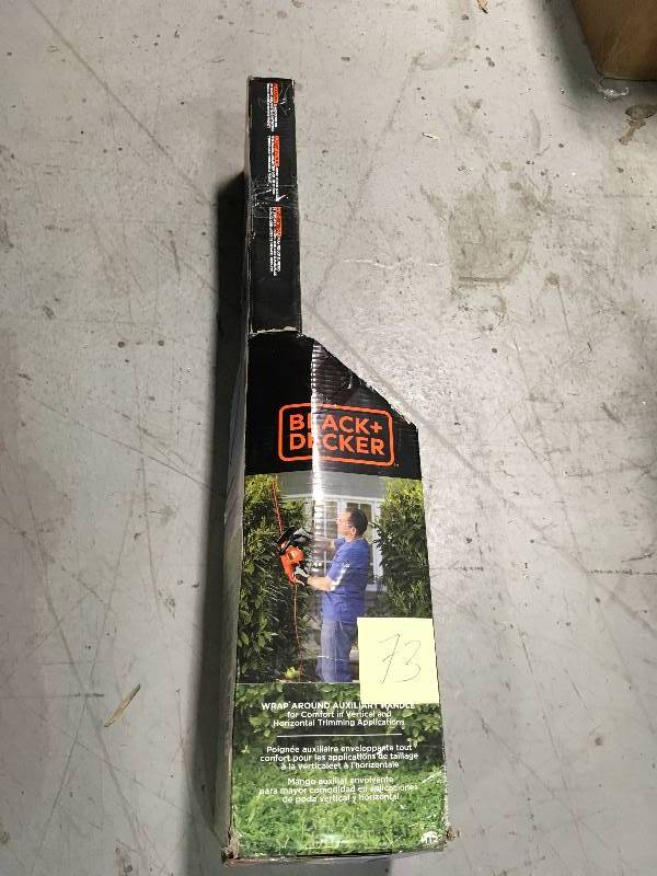 lot 73 image: Black & Decker 22 in. 4.0 Amp Corded Electric Hedge Trimmer  Used in good working cond.