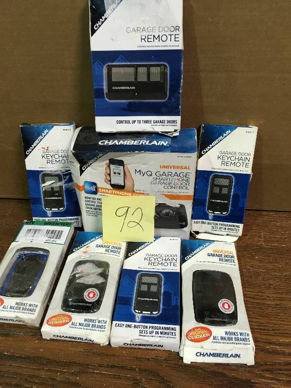 lot 92 image: Mix Lot of 9 Garage Door Remote and Misc in good conditions