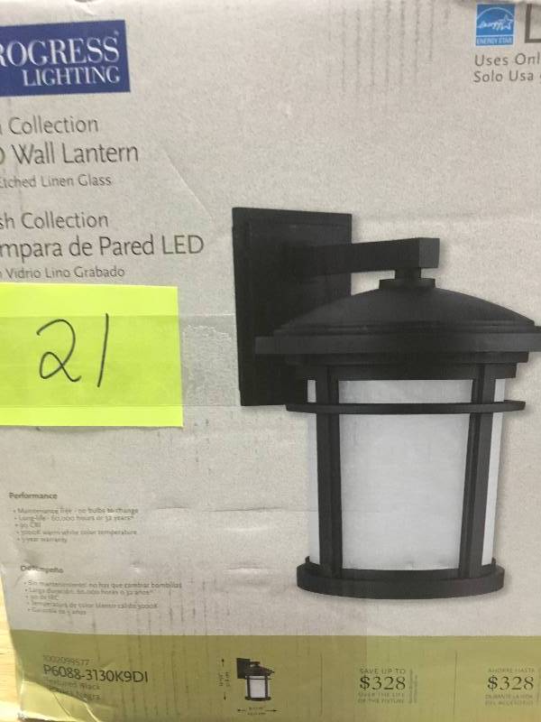 lot 21 image: Wish Collection 1-Light Outdoor 9 Inch Textured Black LED Wall Lantern