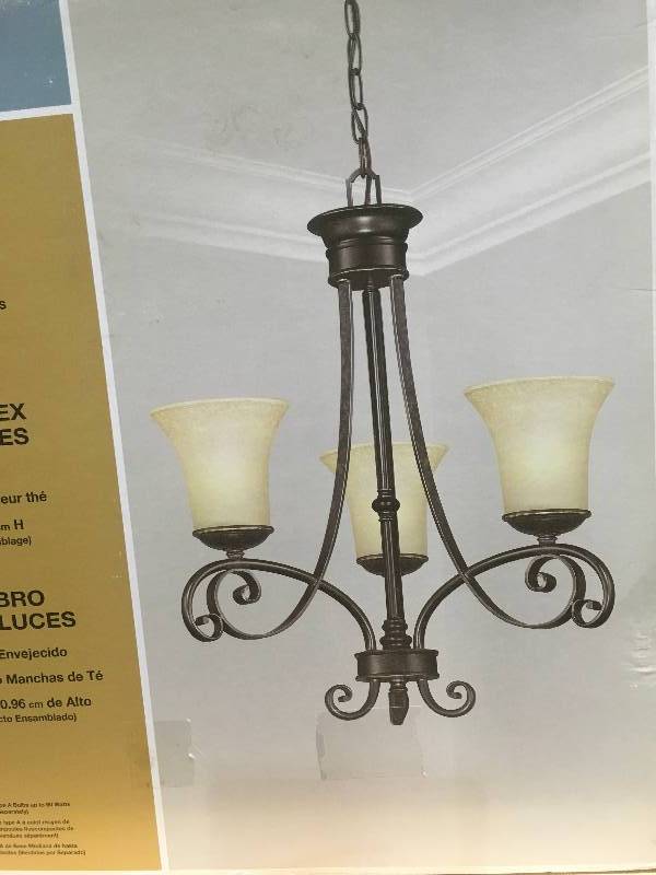 lot 69 image: Hampton Bay Essex 3-Light Aged Black Chandelier with Tea Stained Glass Shades