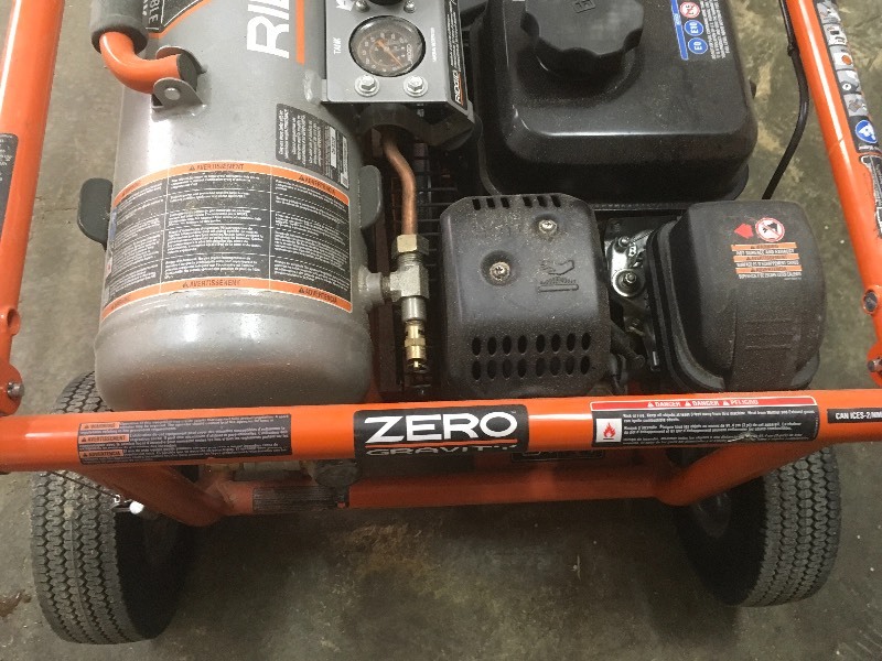 lot 104 image: Ridgid 8 Gal. Portable Gas Power Zero Gravity Air Compressor used in good working condition