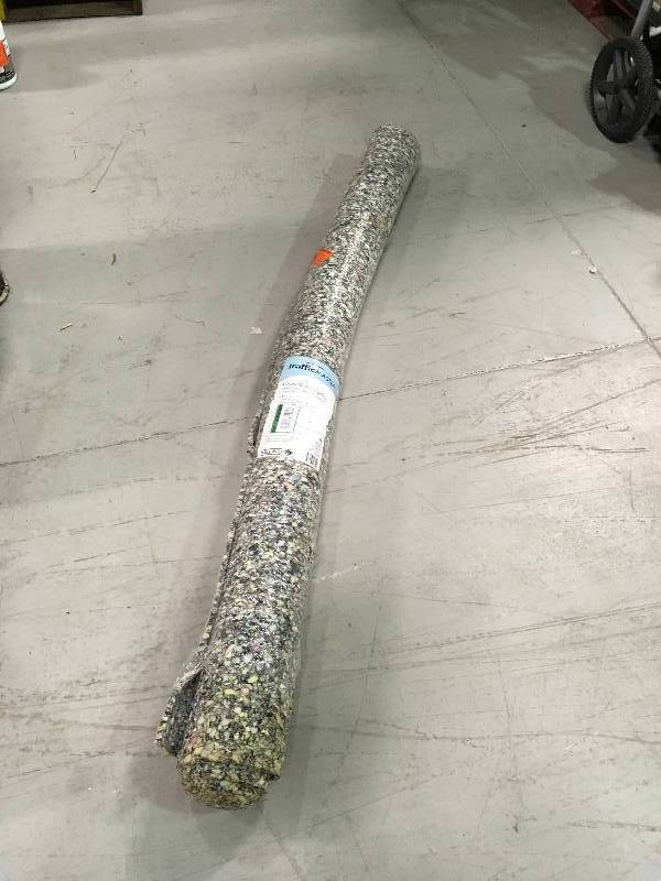 lot 63 image: Traffic Master 6 ft. x 8 ft. 5 lb. Density Premium Plush Rug Pad not used