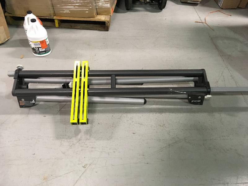 lot 68 image: Ryobi Miter Saw Stand used in good conditions missing one extention braket