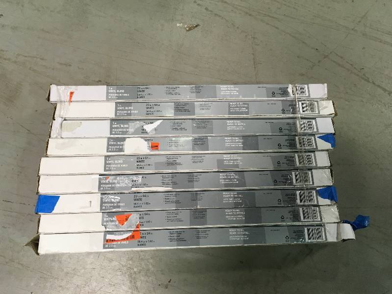 lot 87 image: Lot of 9 pcs of White 1 in. Light Filtering Vinyl Blind - 23 in. W x 64 in. L not used