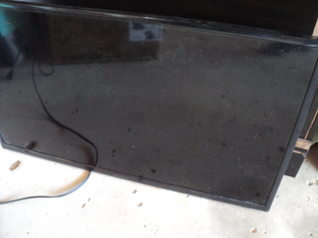 31 Insignia TV - new with remote...