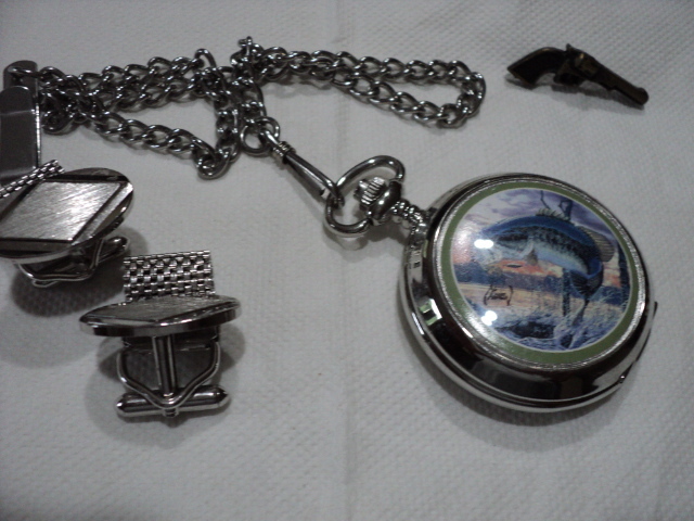 pocket watch, cuff links, and tie t...