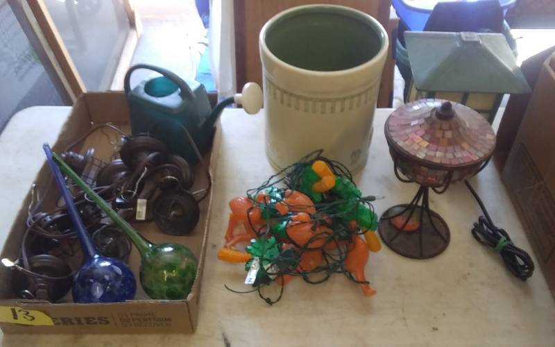 lot 13 image: Patio Party Lights, Planter Pot, Watering Can