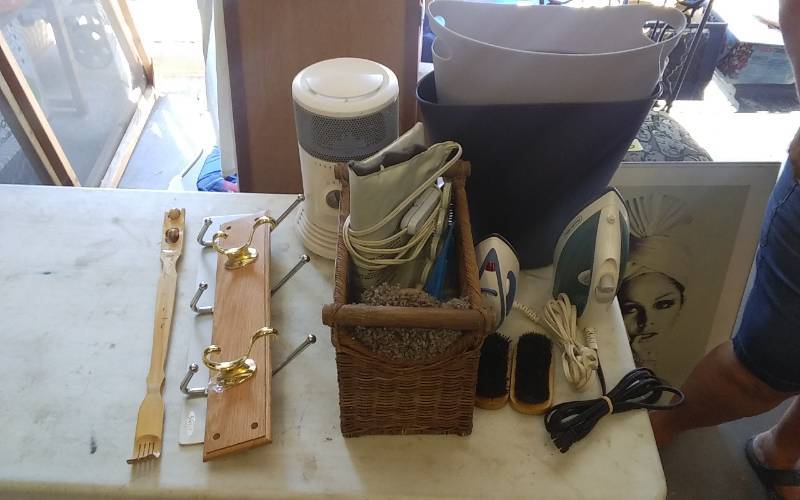 lot 20 image: Honeywell Surround Heater, Irons, Heating Pad, Wall Hooks, Household Misc
