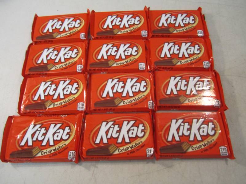 lot 244 image: 12 Kit Kat Candy Bars Best by Aug 2...