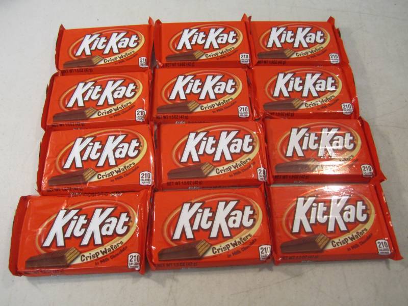 lot 245 image: 12 Kit Kat Candy Bars Best by Aug 2...