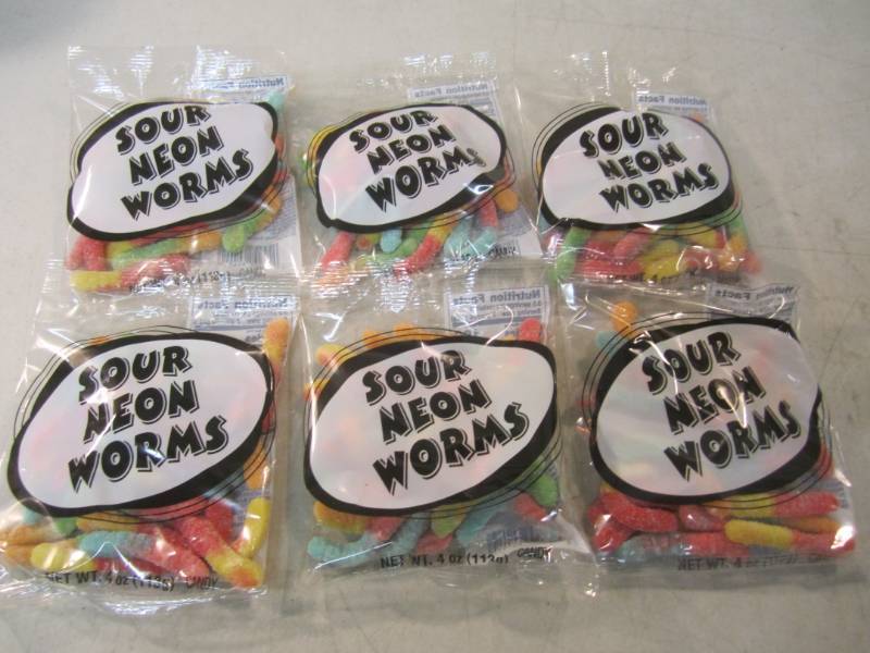 lot 289 image: 6 Bags of Sour Neon Worms Best by F...