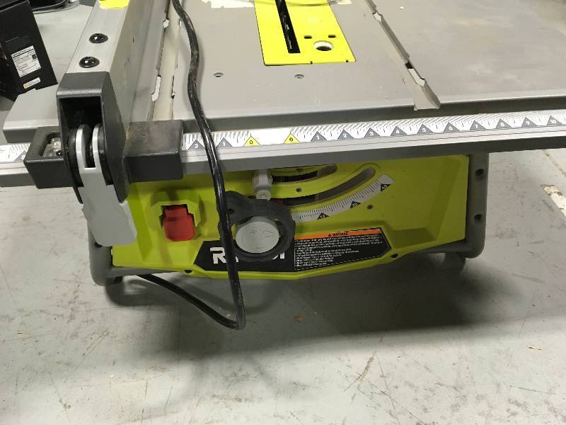 lot 3 image: Ryobi 10 in. Table Saw without Folding Stand and guard in working condition.