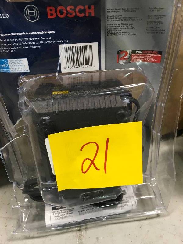lot 21 image: Bosch 18 Volt Lithium-Ion 60-Minute Battery Charger in working condition