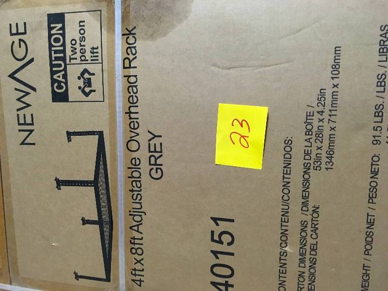 lot 23 image: New Age Performance 96 in. L x 48 in. W x 42 in. H Adjustable VersaRac Ceiling Storage Rack in Gray not used
