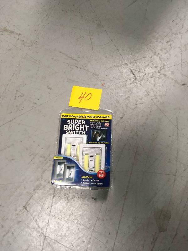 lot 40 image: As Seen On Tv The Super Bright Light Switch with Built In Lights not used