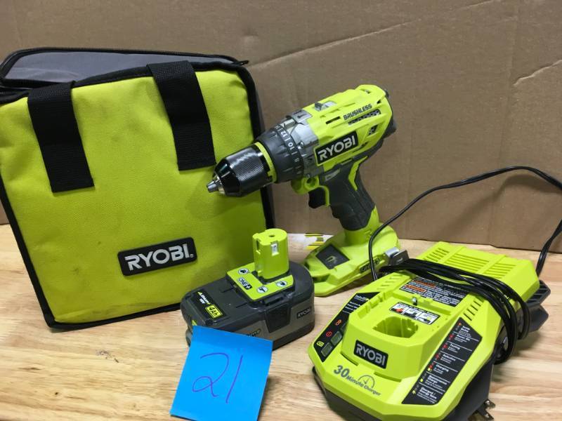 Ryobi 18-Volt ONE Cordless Brushless Hammer DrillDriver, with (1) 4.0 Ah Battery, Charger, and Bag used in good working condition