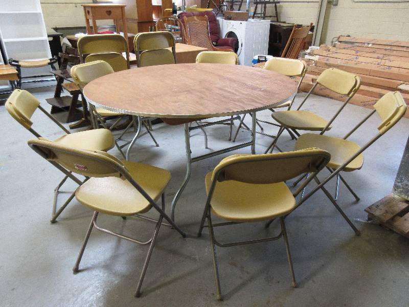 lot 104 image: ROUND FOLDING TABLE WITH 12 CHAIRS