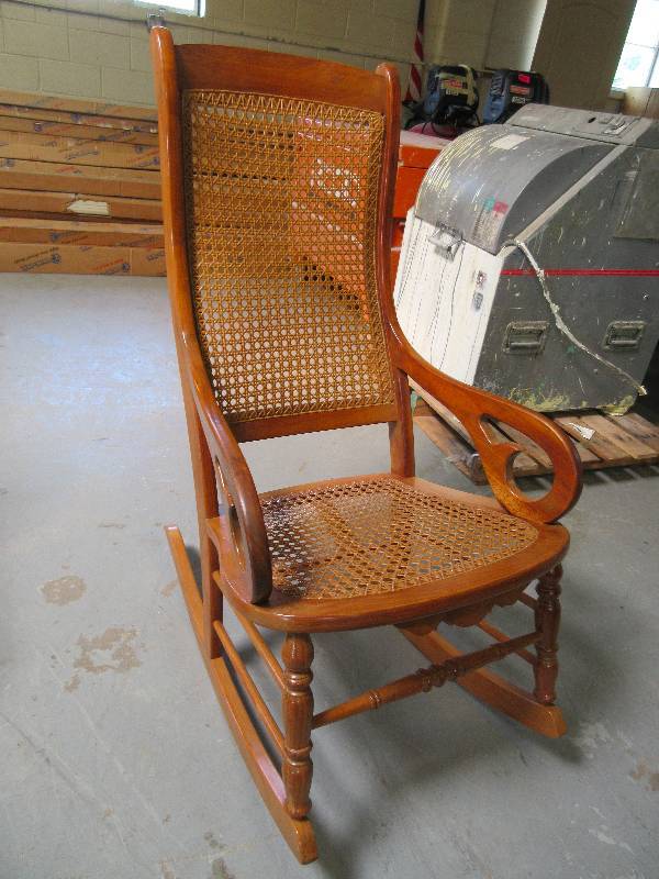 lot 116 image: SOLID WOOD ROCKER WITH CANE SEAT AND BACK