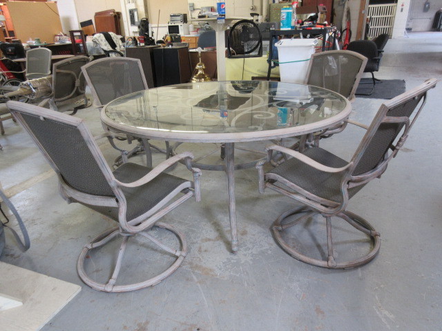 lot 143 image: LARGE METAL AND GLASS PATIO SET