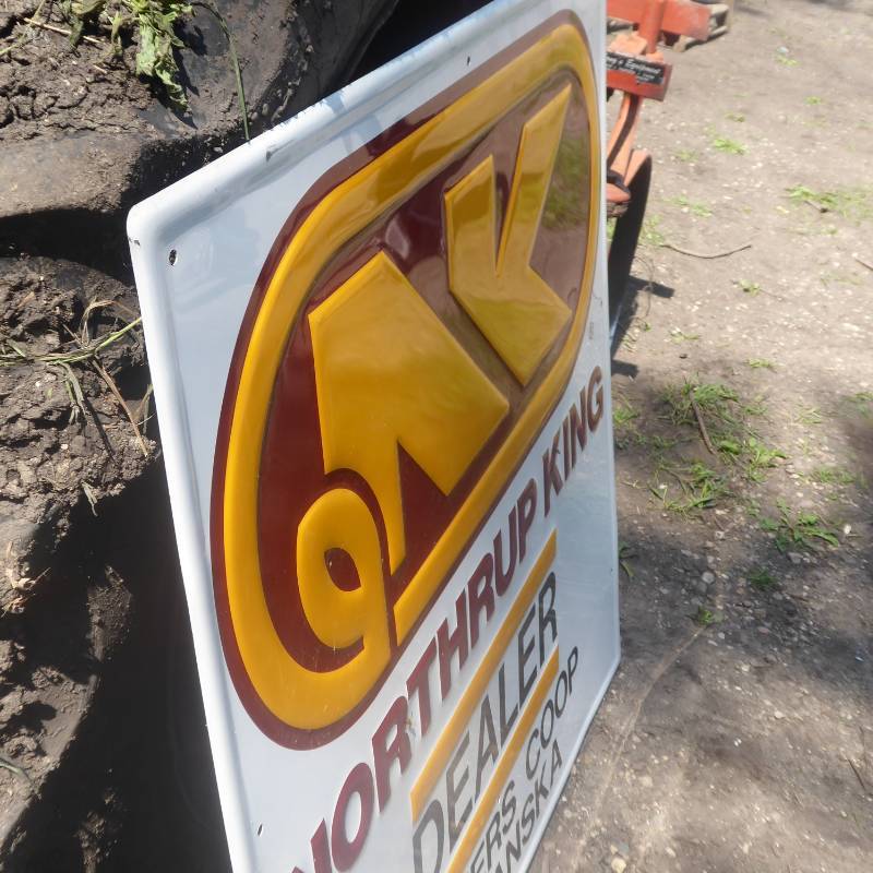 lot 14 image: Northrup King Steel Embossed Sign