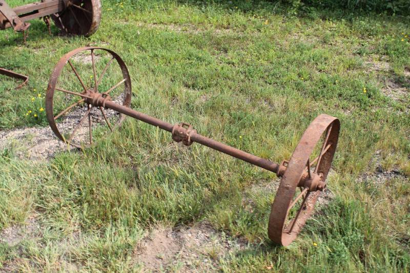 Old Antique Wagon Axle Lawn Ornament