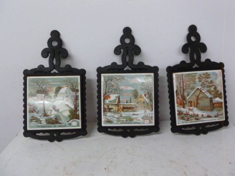 lot 75 image: Cast Iron Trivets